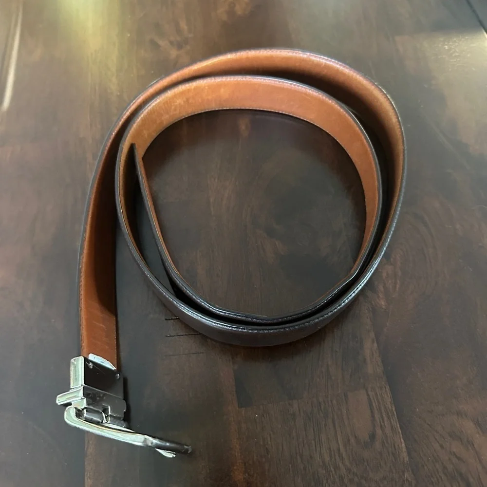 Cole Haan reversible belt. Size 42 silver buckle. Brown & dark brown